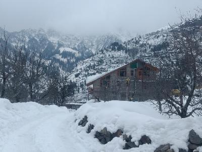 Peak And Snow Cottage Photo